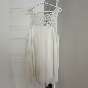 Anthropologie white pleated and lace mini dress.